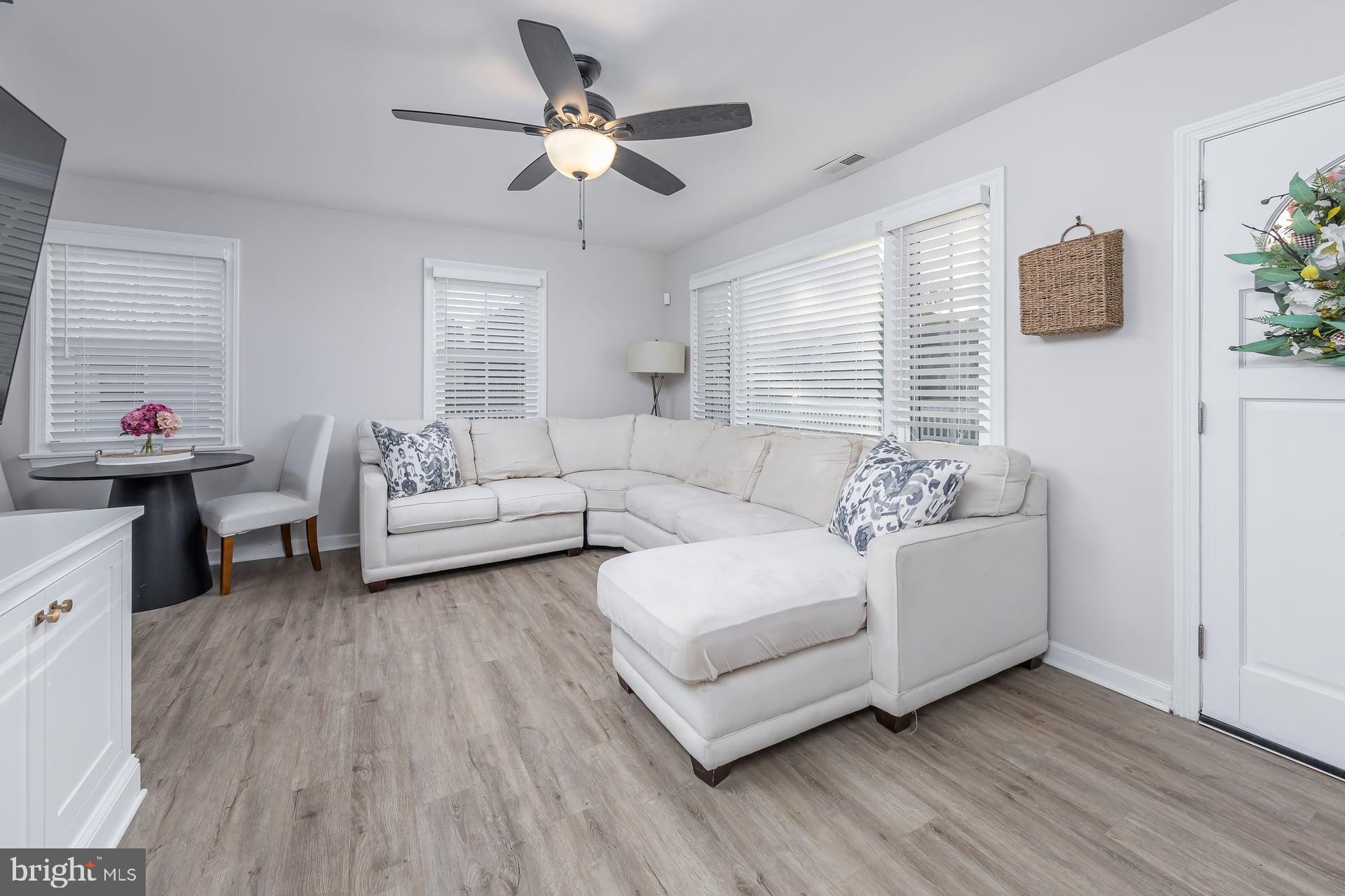 225 Spruce Street Haddonfield, NJ 08033 - Photo 11 of 28 a living room with furniture and a wooden floor