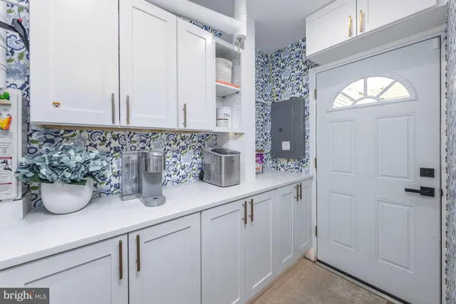 a bathroom with a sink and mirror