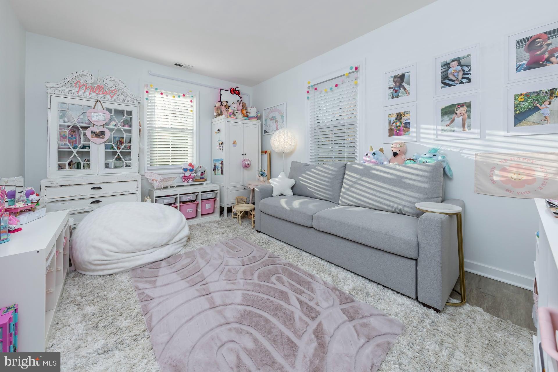 225 Spruce Street Haddonfield, NJ 08033 - Photo 22 of 28 a living room with furniture and a couch