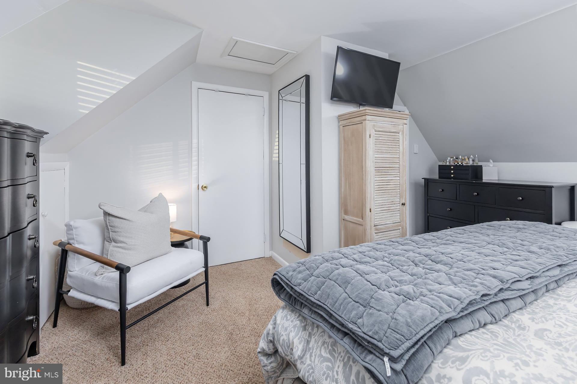 225 Spruce Street Haddonfield, NJ 08033 - Photo 26 of 28 a bedroom with a bed and a television