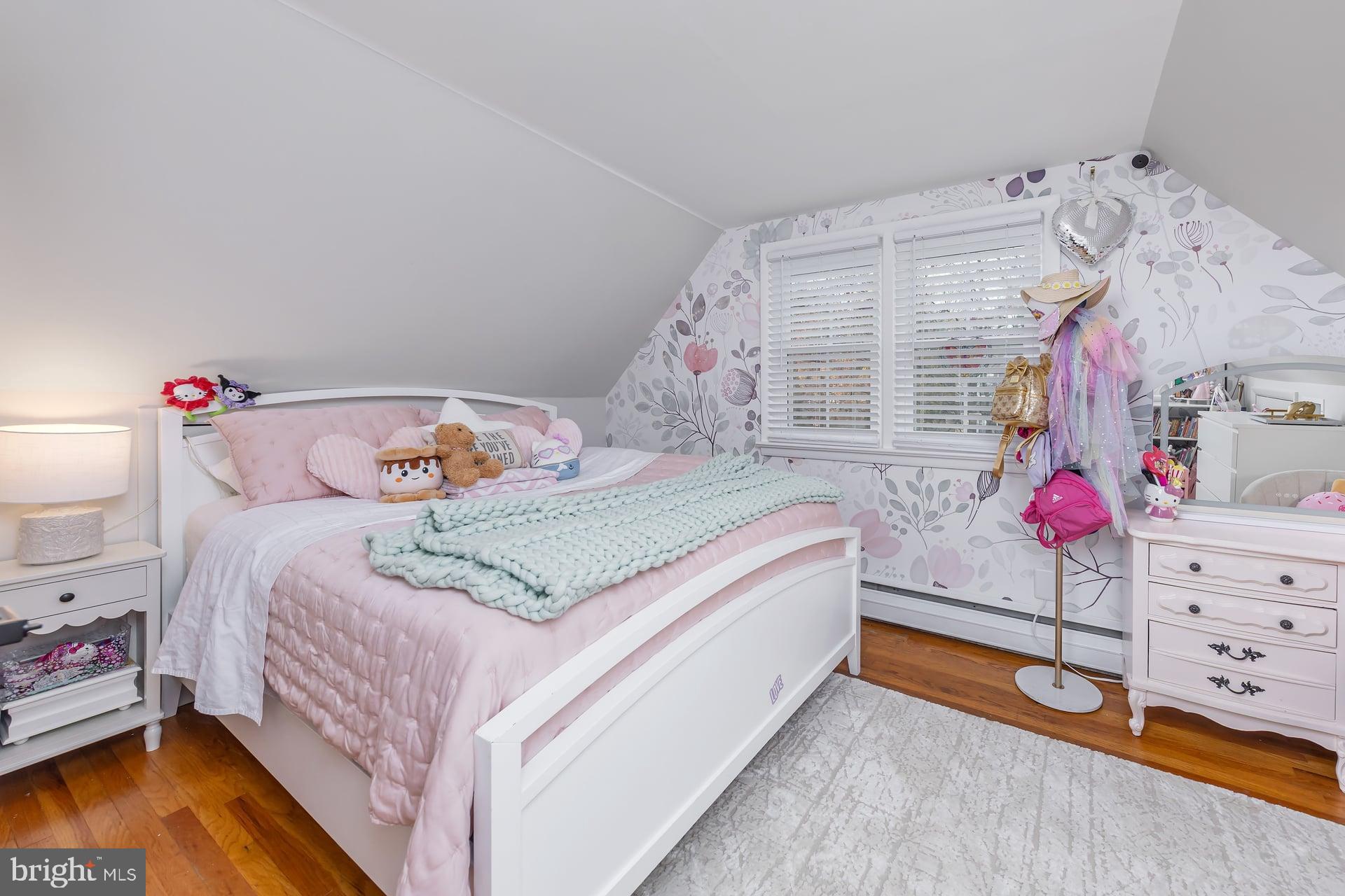 225 Spruce Street Haddonfield, NJ 08033 - Photo 28 of 28 a bedroom with a bed and dresser