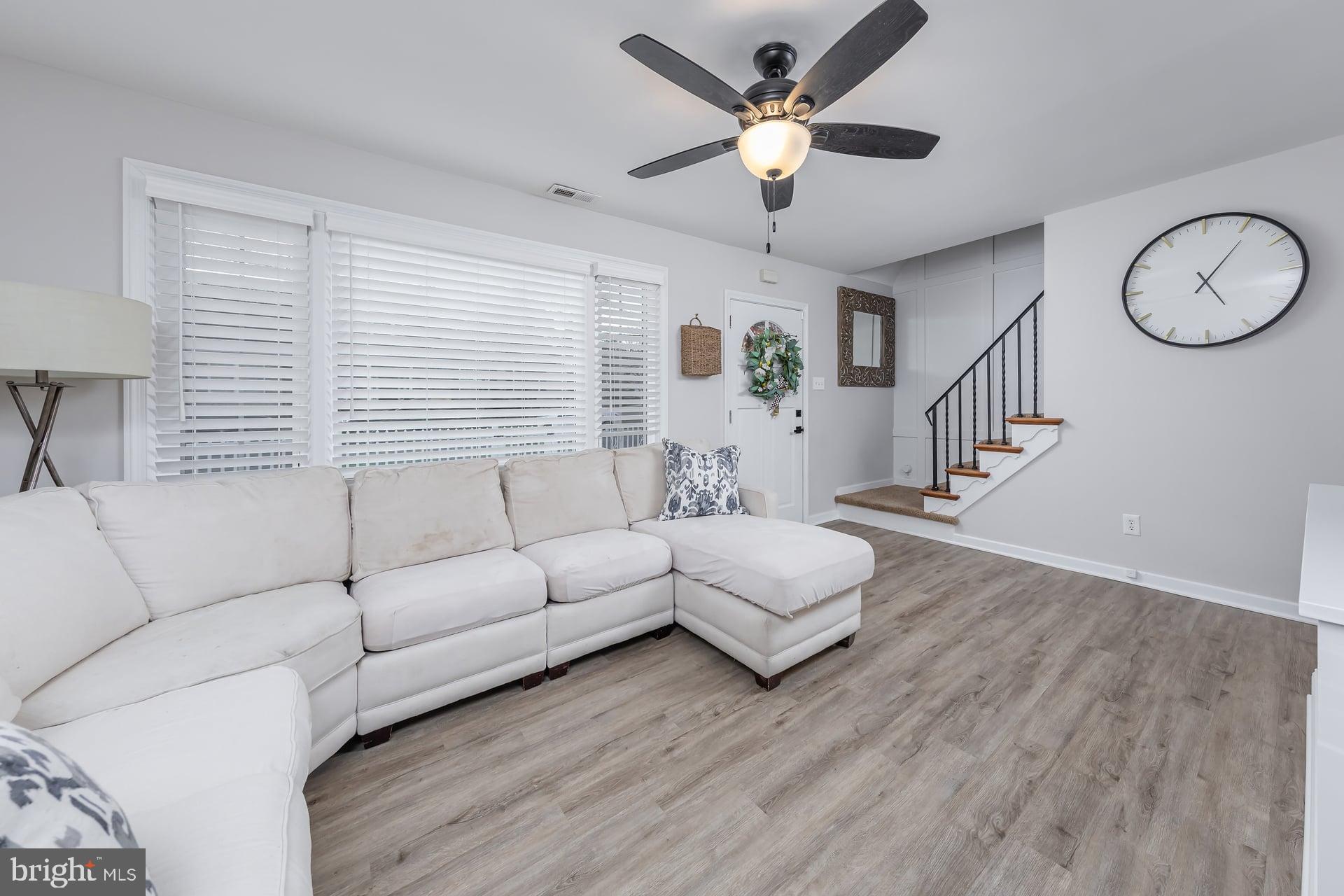 225 Spruce Street Haddonfield, NJ 08033 - Photo 9 of 28 a living room with furniture and a large window