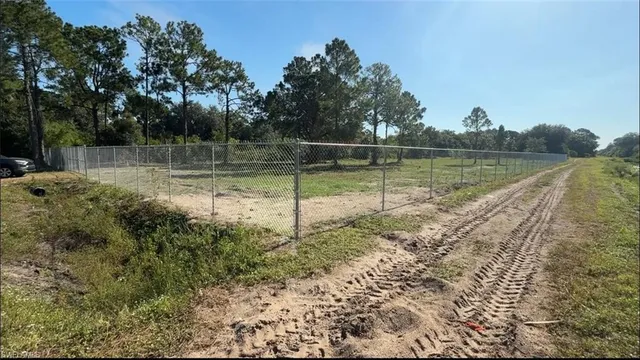 a view of lake with green space