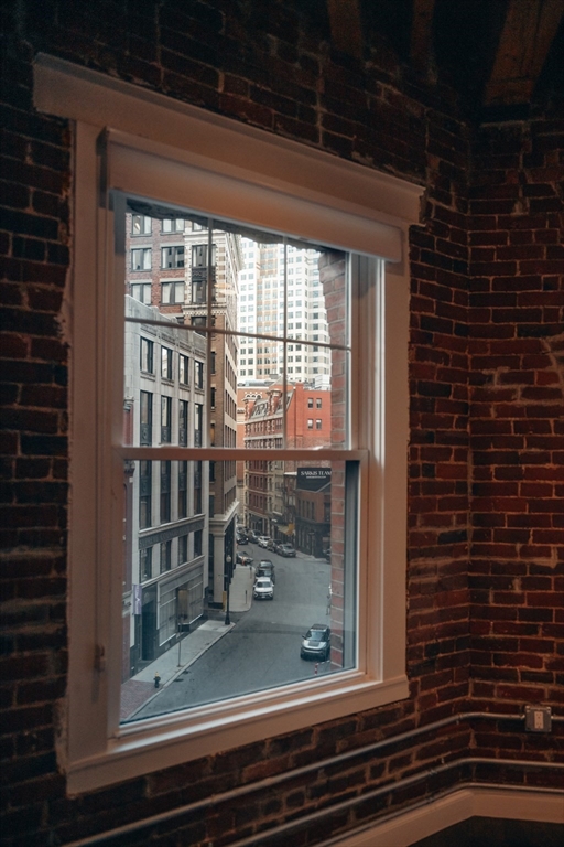 281 Franklin Street, Unit 503 Boston, MA 02110 - Photo 3 of 6 a view of a glass door