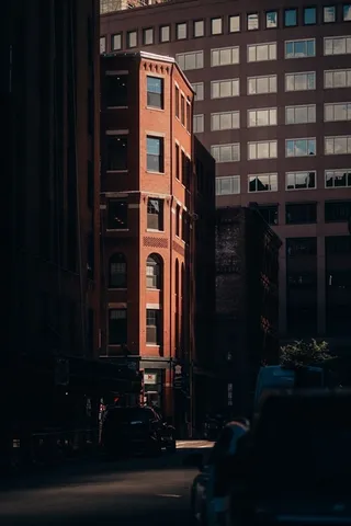 a view of a building with sitting area