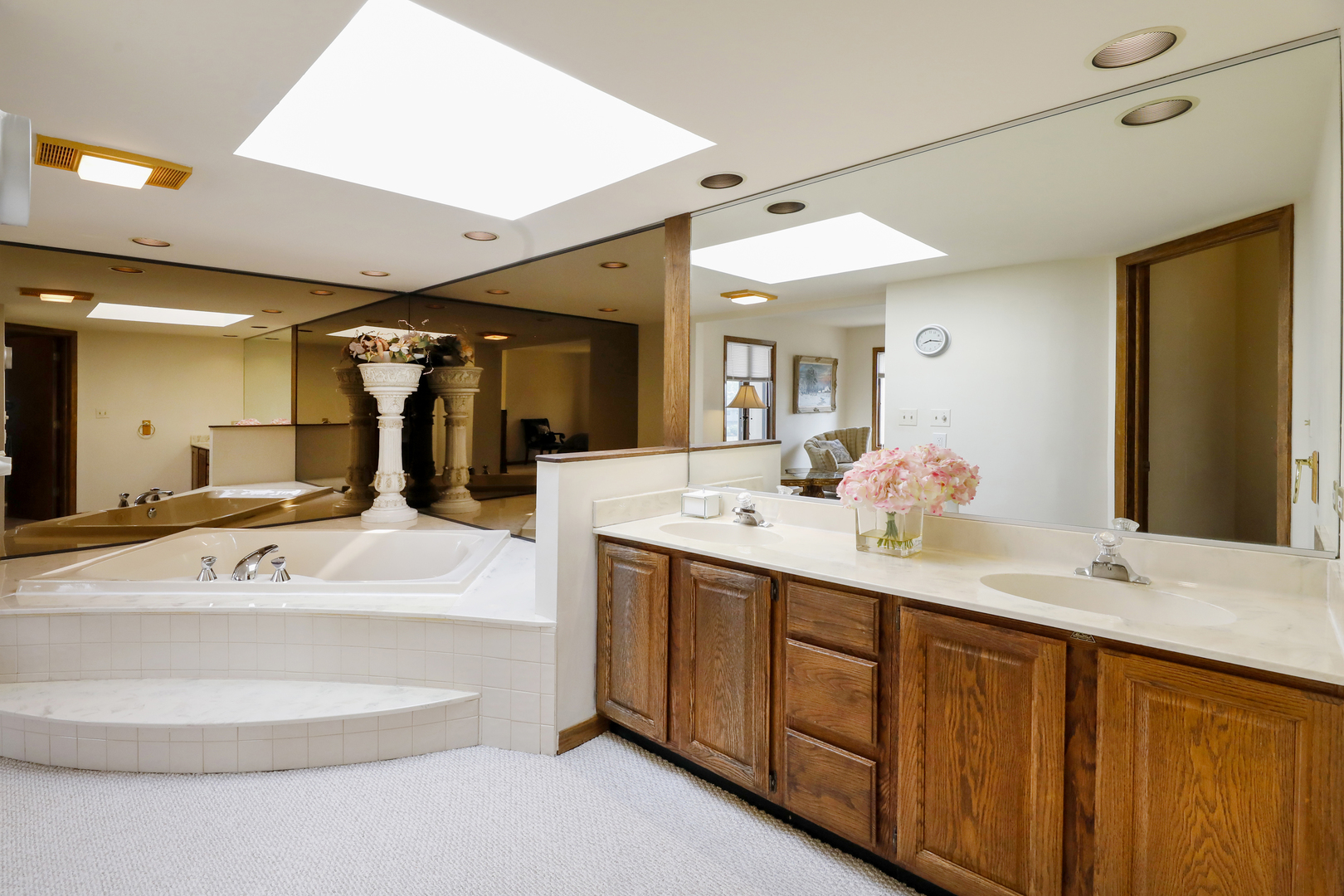 1975 Brookside Lane Hoffman Estates, IL 60169 - Photo 17 of 32 a spacious bathroom with a double vanity sink mirror and