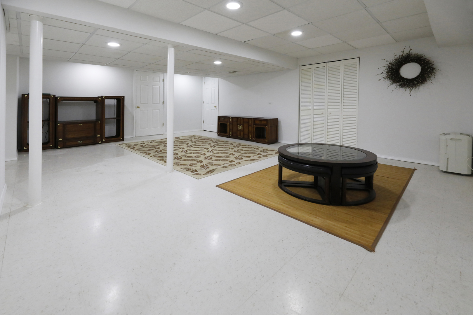 1975 Brookside Lane Hoffman Estates, IL 60169 - Photo 25 of 32 a living room with furniture and a flat screen tv