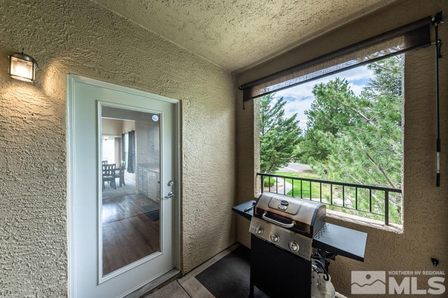 9050 Double R Boulevard Reno, NV 89521 - Photo 26 of 40 a view of a balcony and an outdoor space
