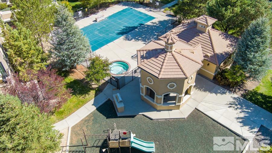 9050 Double R Boulevard Reno, NV 89521 - Photo 38 of 40 an aerial view of a house with a yard