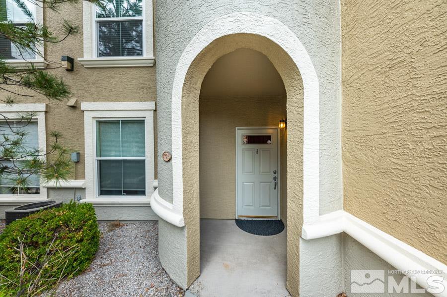 9050 Double R Boulevard Reno, NV 89521 - Photo 9 of 40 a view of entrance door of house