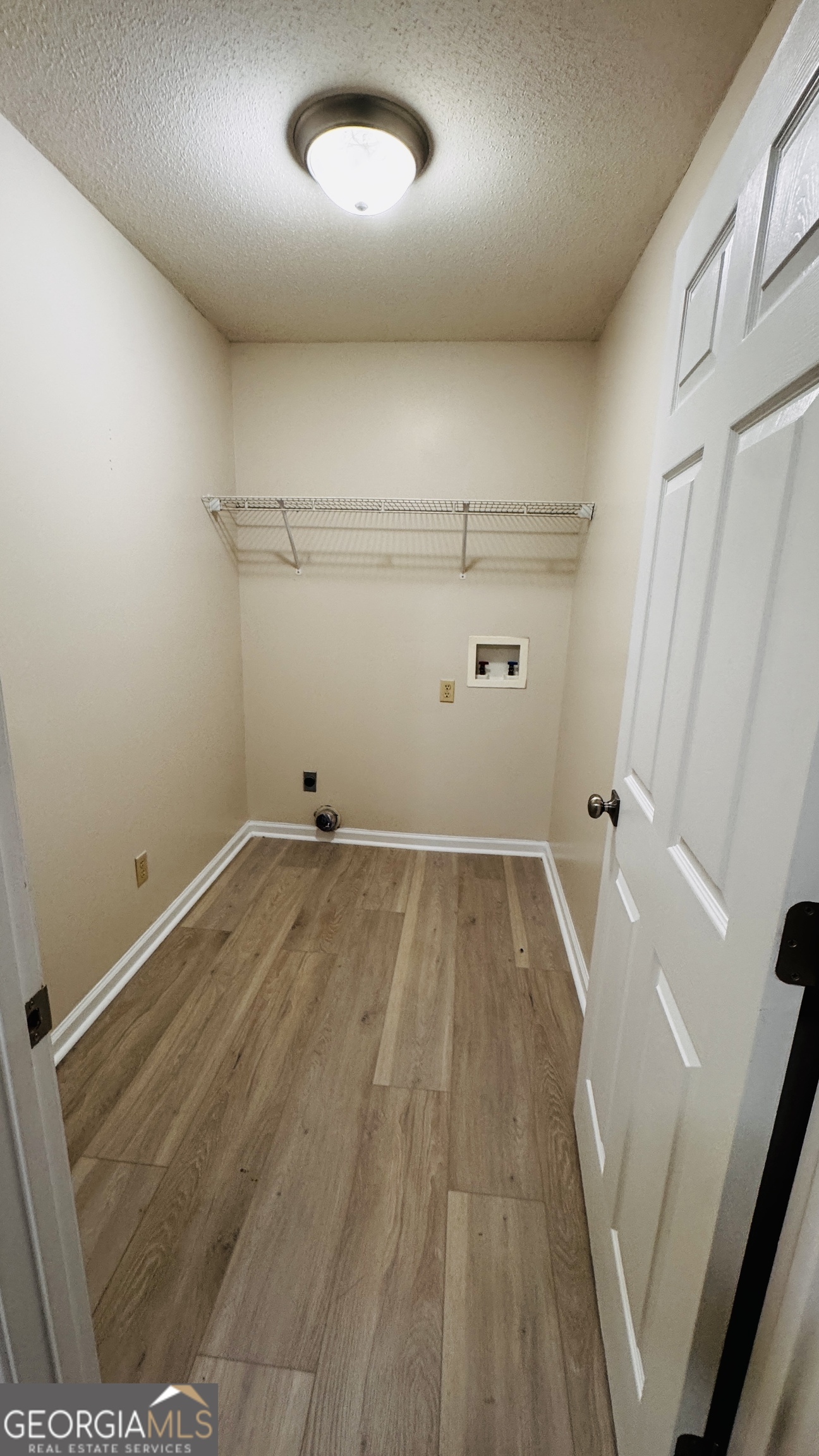 512 Antietum Road Collins, GA 30421 - Photo 7 of 16 an empty room with an empty space