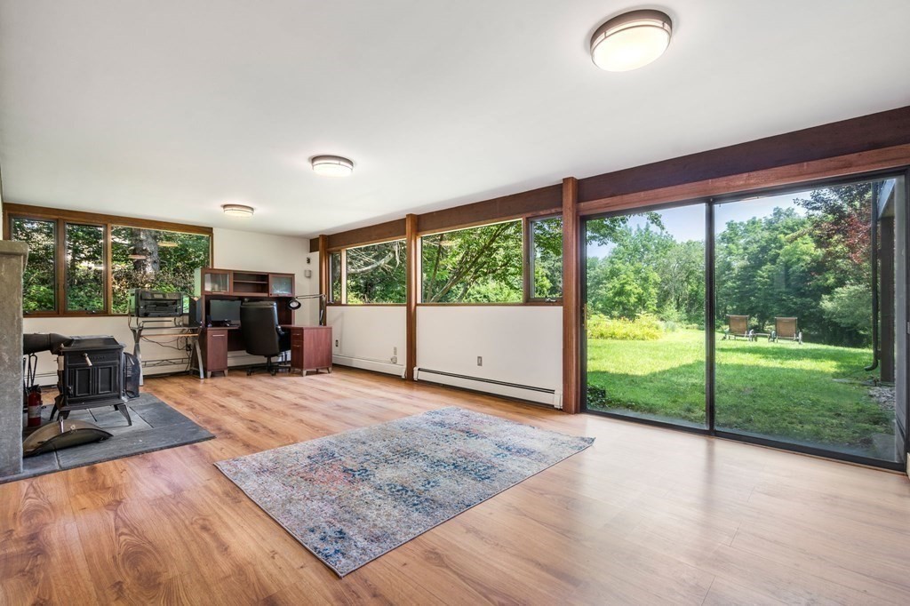 20 Meadowbrook Road Westwood, MA 02090 - Photo 24 of 36 a view of a livingroom with wooden floor and furniture