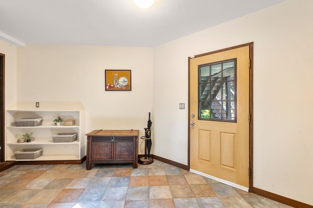 20 Meadowbrook Road Westwood, MA 02090 - Photo 26 of 36 a living room with furniture and a window