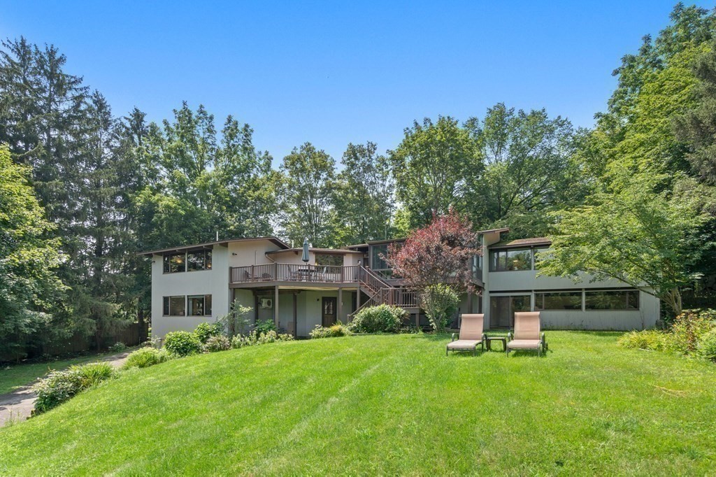 20 Meadowbrook Road Westwood, MA 02090 - Photo 34 of 36 front view of a house with a garden