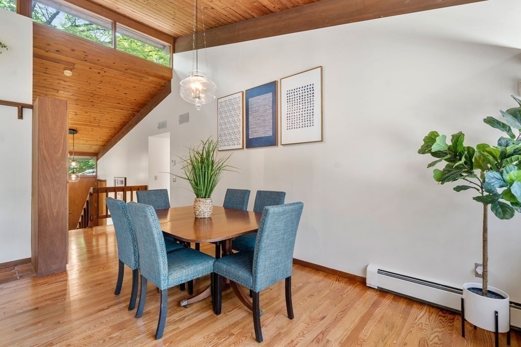 20 Meadowbrook Road Westwood, MA 02090 - Photo 10 of 36 a view of a dining room with furniture and wooden floor