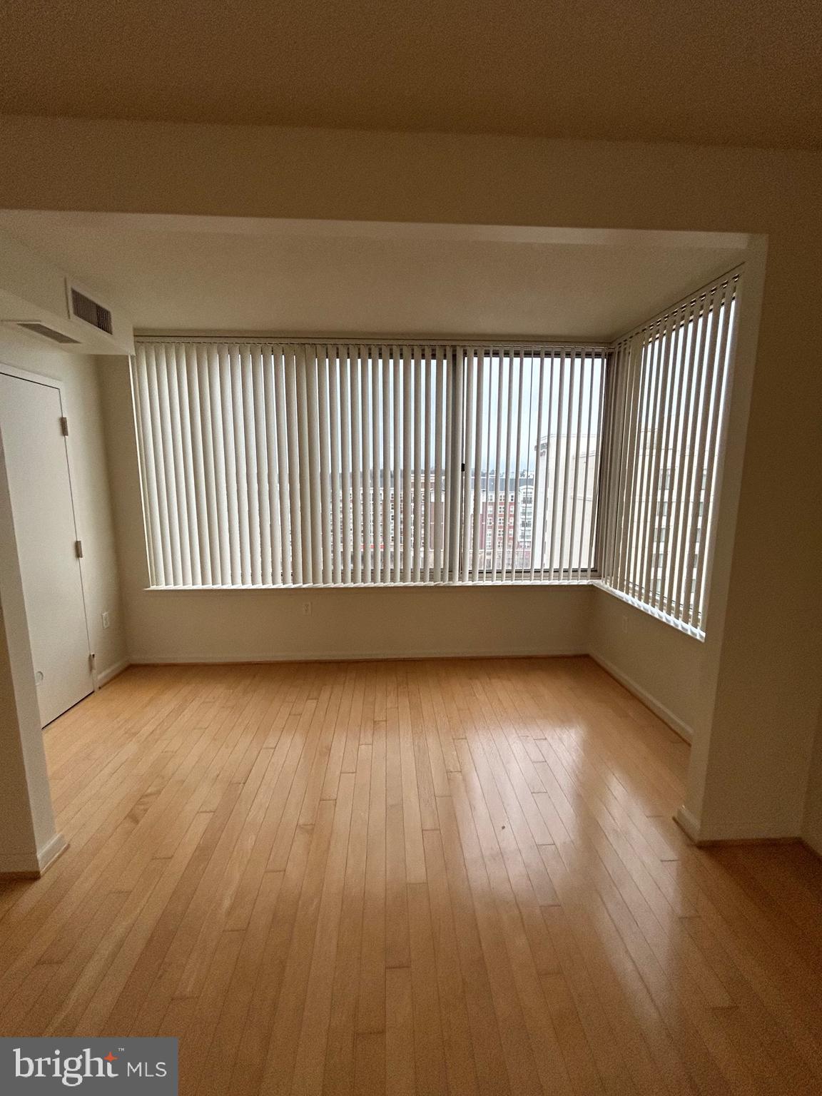 2726 Gallows Road, Unit 1104 Vienna, VA 22180 - Photo 18 of 37 a view of a room with wooden floor