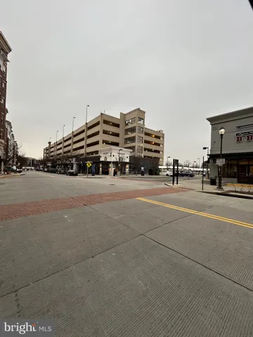 a view of a street with an outdoor space