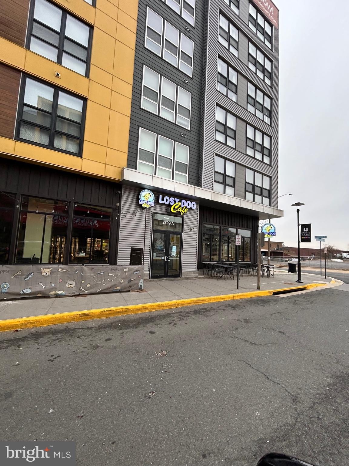2726 Gallows Road, Unit 1104 Vienna, VA 22180 - Photo 33 of 37 a view of a swimming pool with an outdoor seating