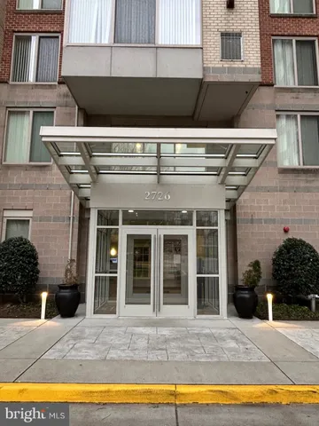a view of a building with a lounge chair