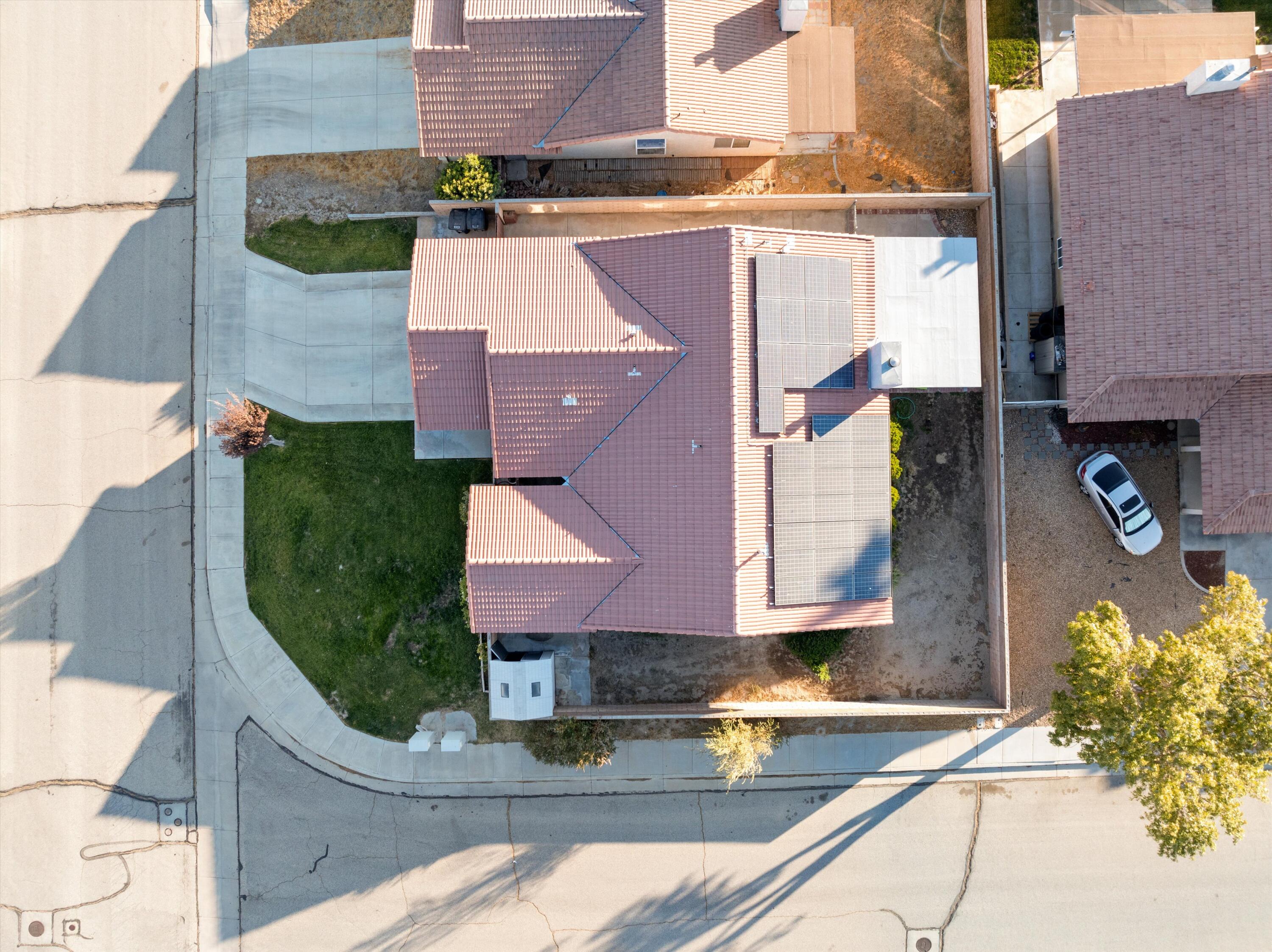 3525 West Roxbury Street Rosamond, CA 93560 - Photo 25 of 26 an aerial view of residential houses with outdoor space