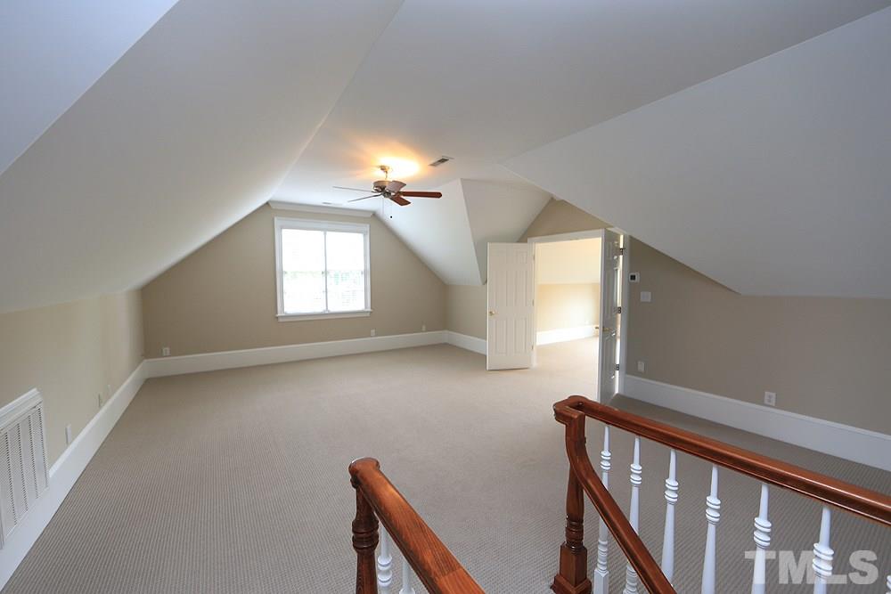 5216 Wynneford Way Raleigh, NC 27614 - Photo 21 of 28 A second set of steps from the back hall leads to the bonus room with wet bar. There are ceiling fans in the bonus, bedrooms, family room and exercise room.