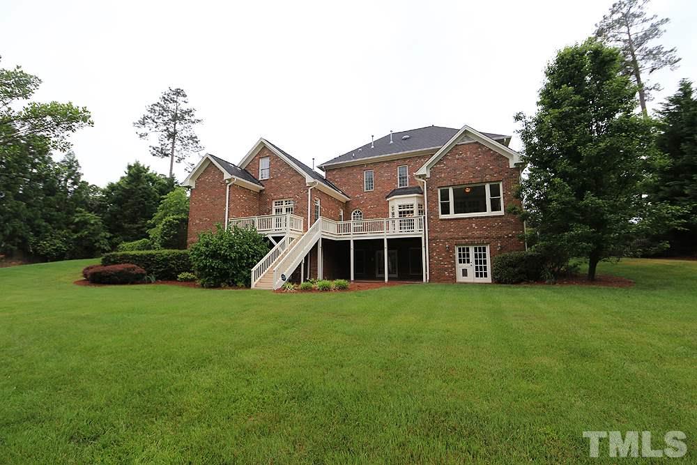5216 Wynneford Way Raleigh, NC 27614 - Photo 27 of 28 The home has so much dimension and interest and a fabulous backyard! Enjoy the view from inside even more with the new clear glass windows.