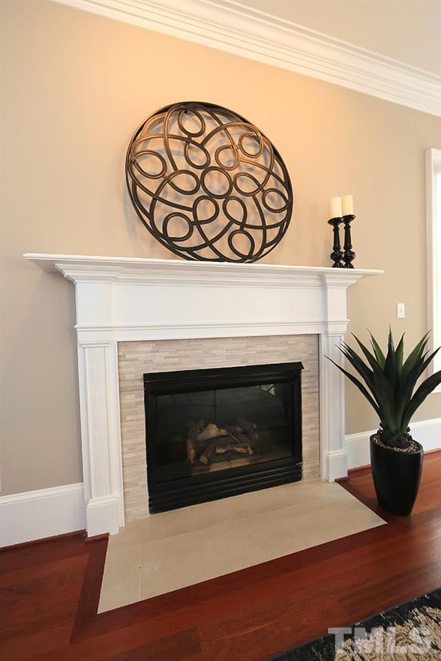 5216 Wynneford Way Raleigh, NC 27614 - Photo 9 of 28 A closer view of the fireplace surround.