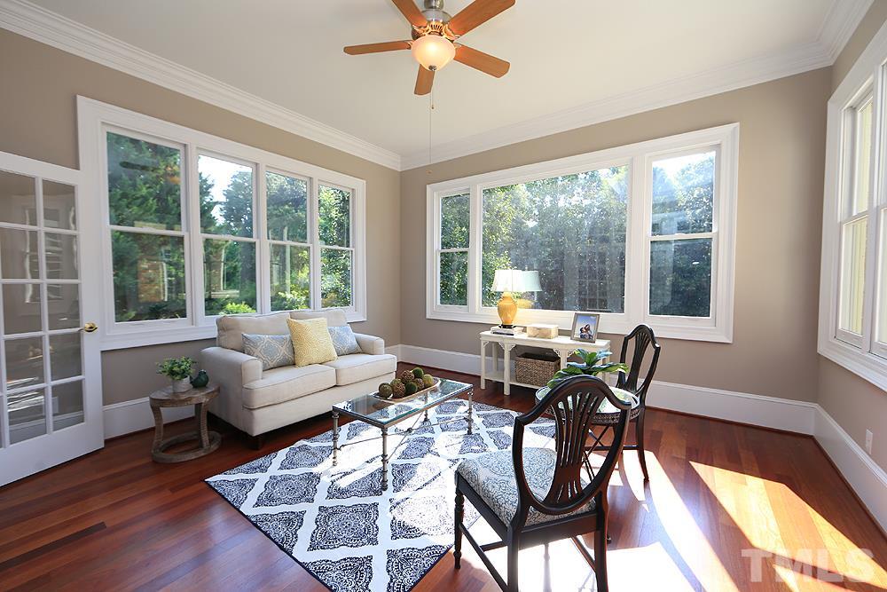 5216 Wynneford Way Raleigh, NC 27614 - Photo 10 of 28 The window in the sunroom are wood replaced in mid 2018, the remaining windows in the home are vinyl just replaced in 2019.