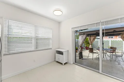 a livingroom with window and a couch