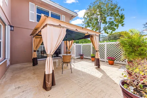 a view of chair and table in the patio