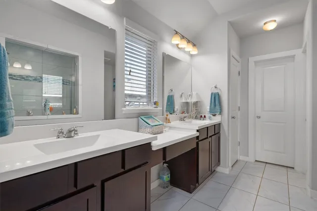 a view with a sink and a mirror