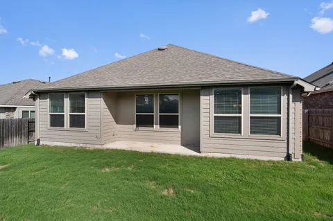 a view of front of a house with a yard