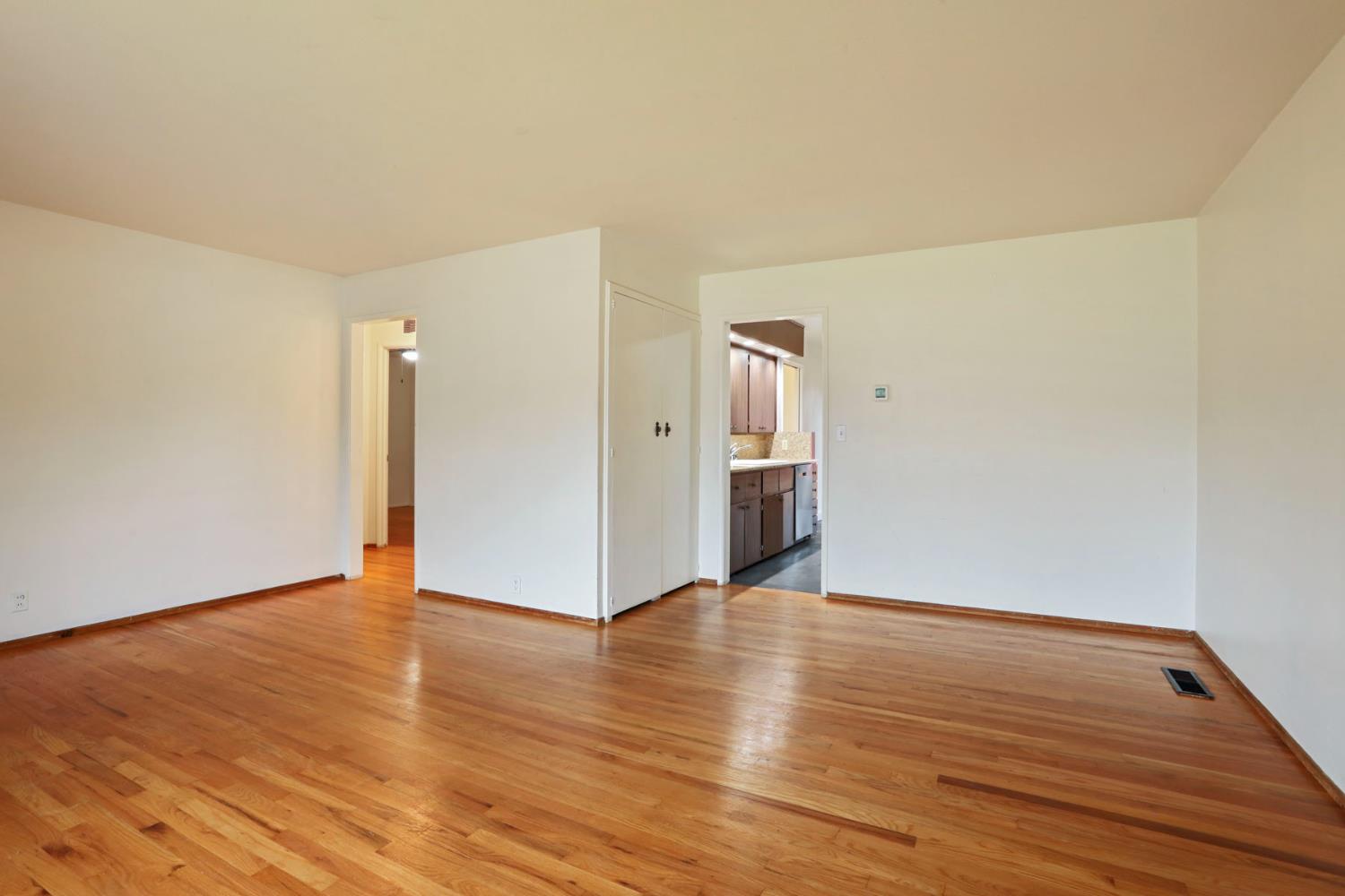 2755 Inman Avenue Stockton, CA 95204 - Photo 11 of 34 a view of an empty room with wooden floor