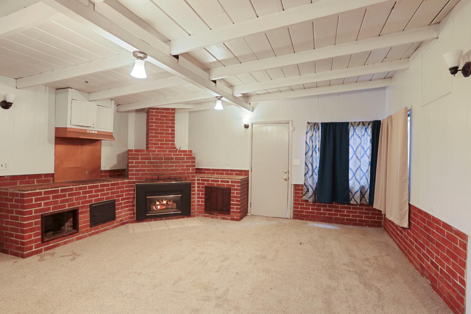 2755 Inman Avenue Stockton, CA 95204 - Photo 26 of 34 a view of an empty room with a fireplace