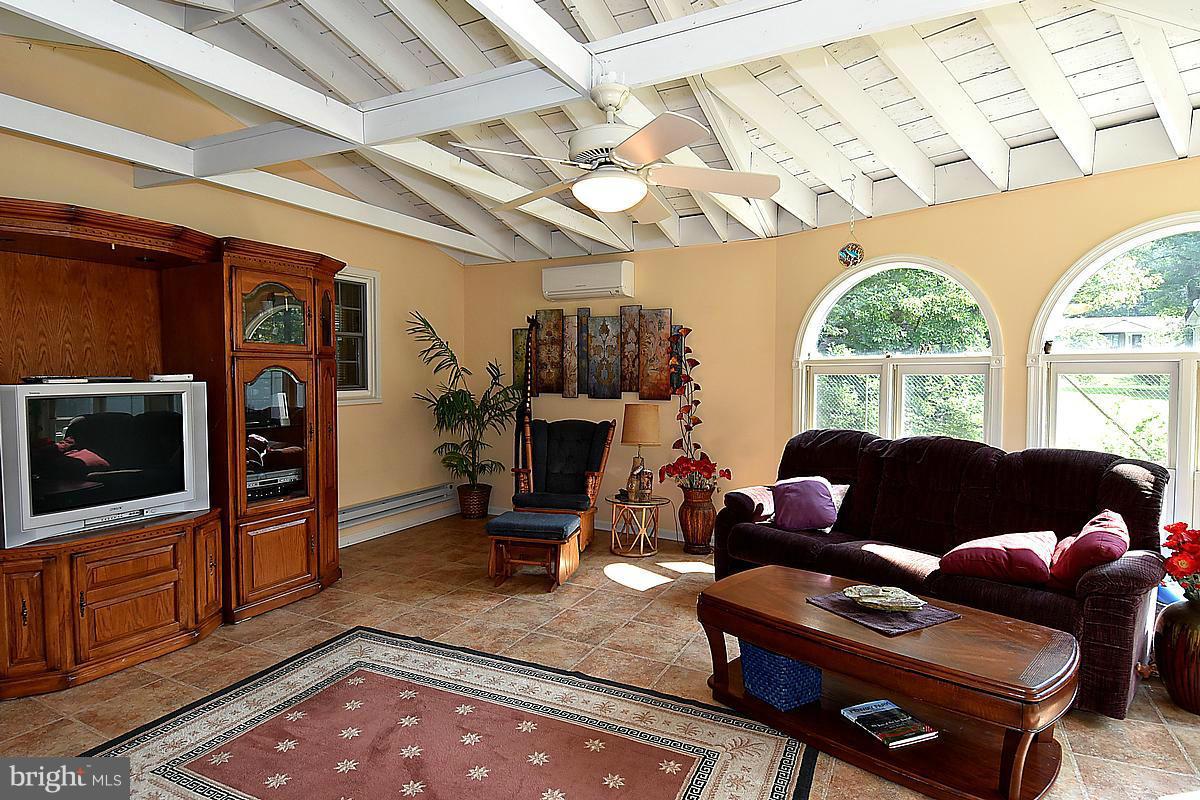 304 Manning Road East Accokeek, MD 20607 - Photo 17 of 30 Exposed ceiling beams and lots of light