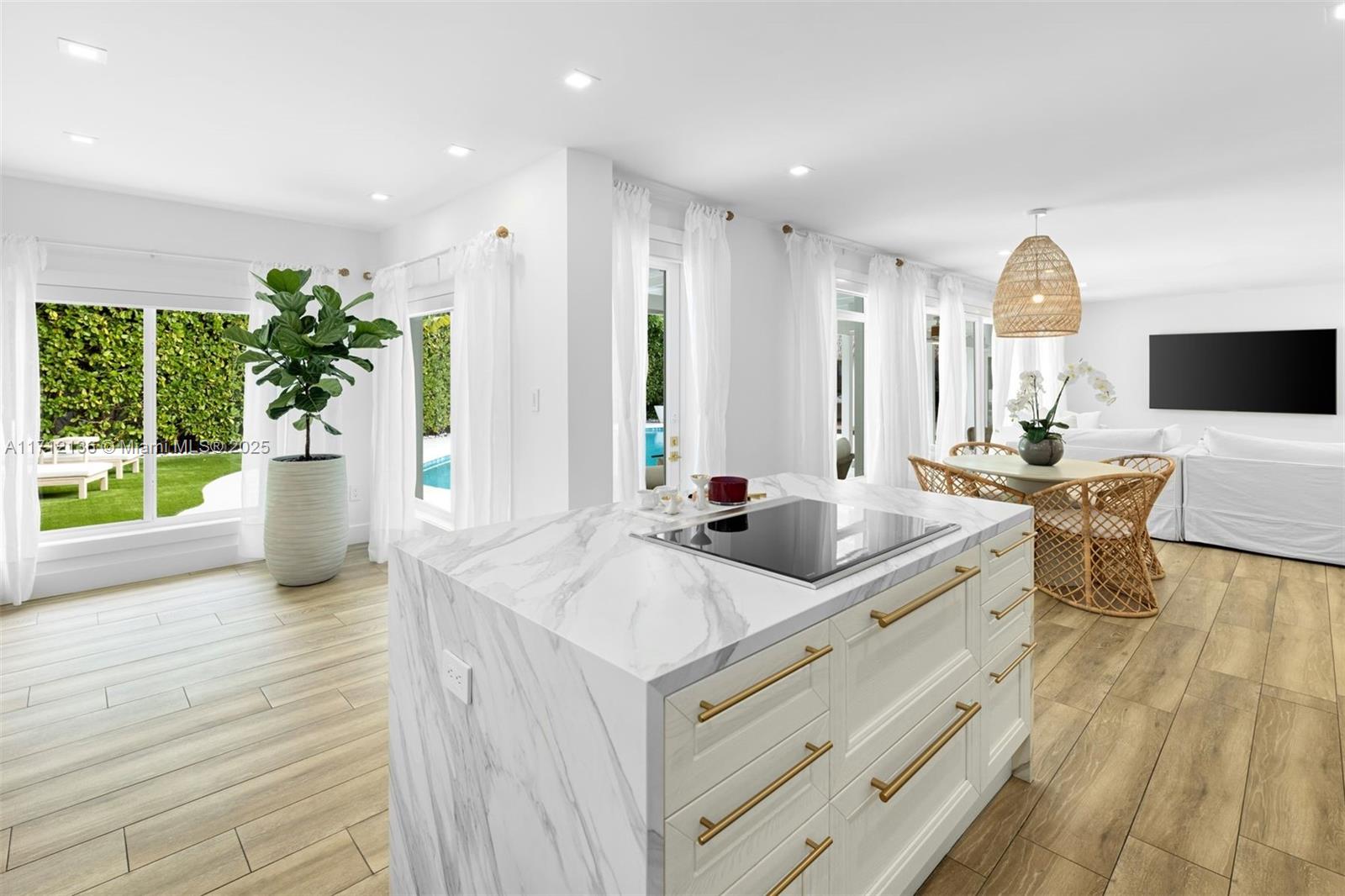 345 Gulf Road Key Biscayne, FL 33149 - Photo 13 of 43 a very nice looking room with a large window