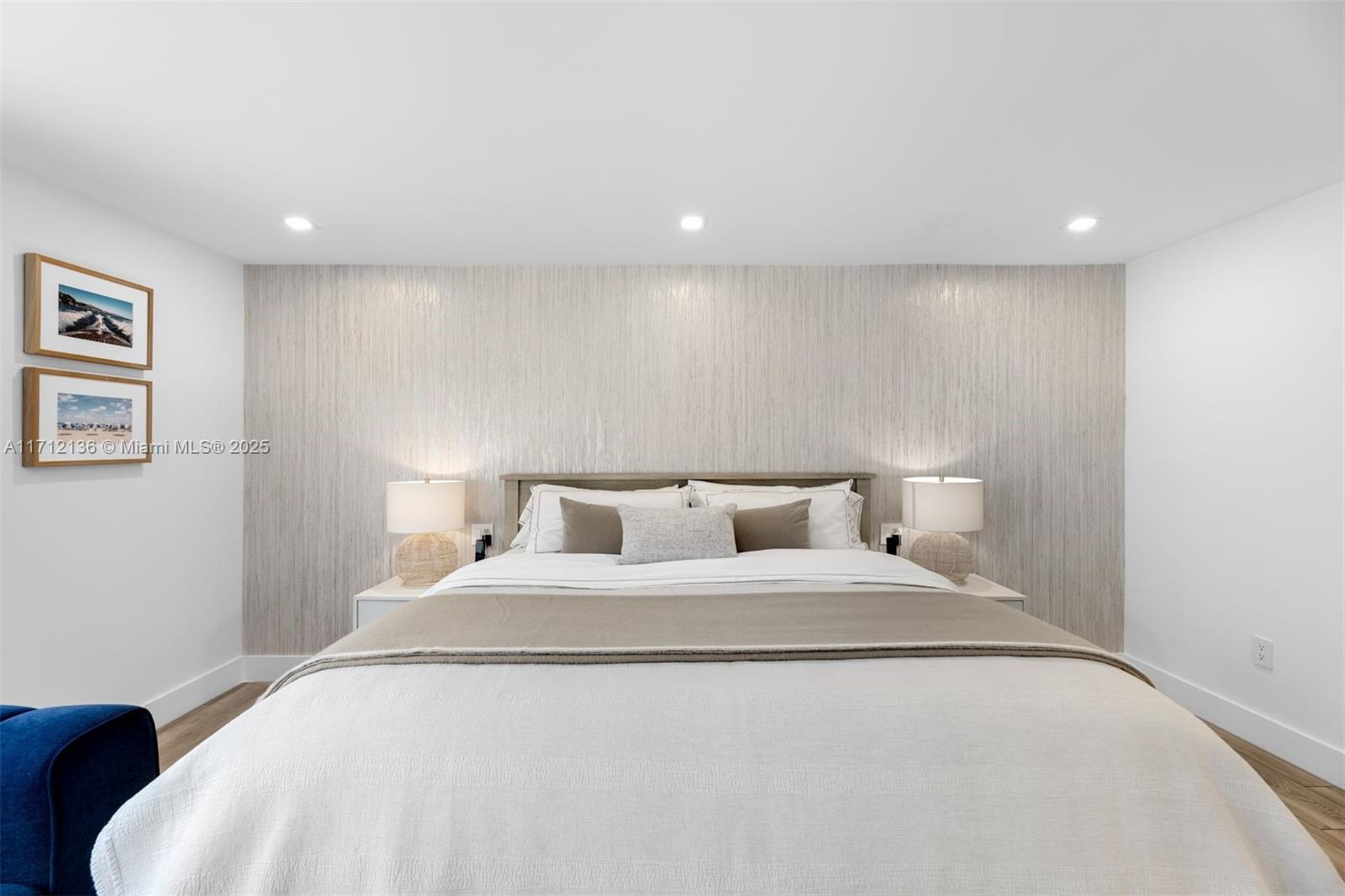 345 Gulf Road Key Biscayne, FL 33149 - Photo 17 of 43 a bedroom with a bed and a night stand