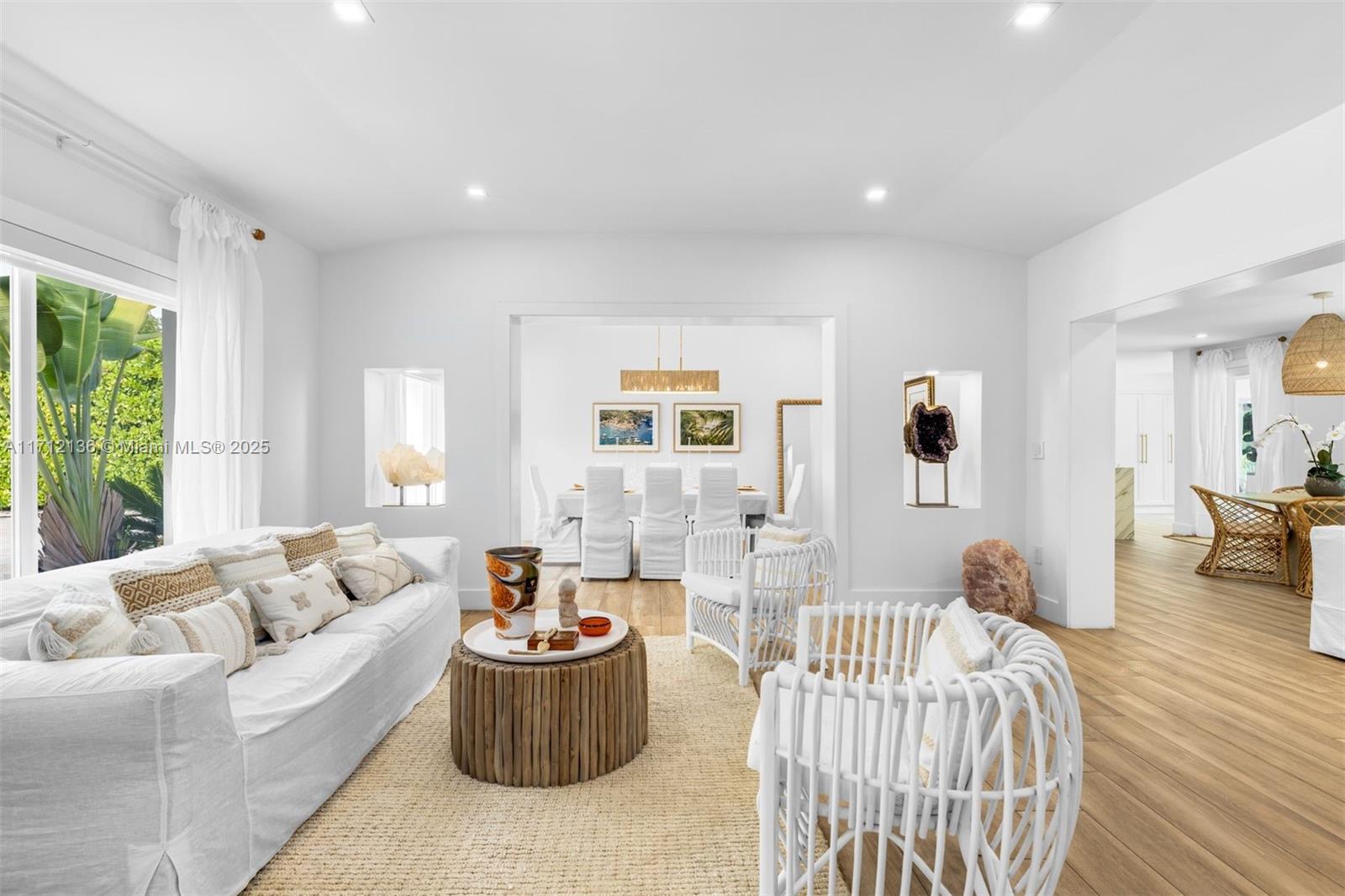 345 Gulf Road Key Biscayne, FL 33149 - Photo 3 of 43 a living room with furniture and a large window