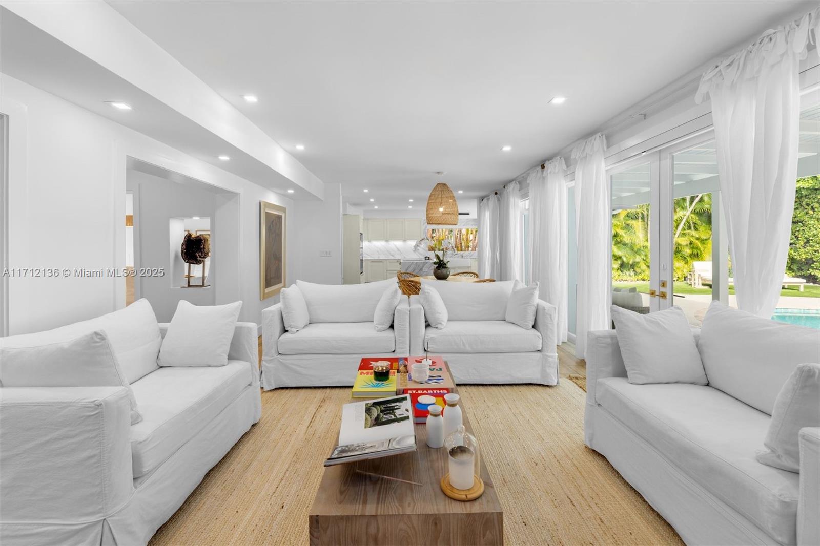 345 Gulf Road Key Biscayne, FL 33149 - Photo 8 of 43 a living room with furniture and a large window