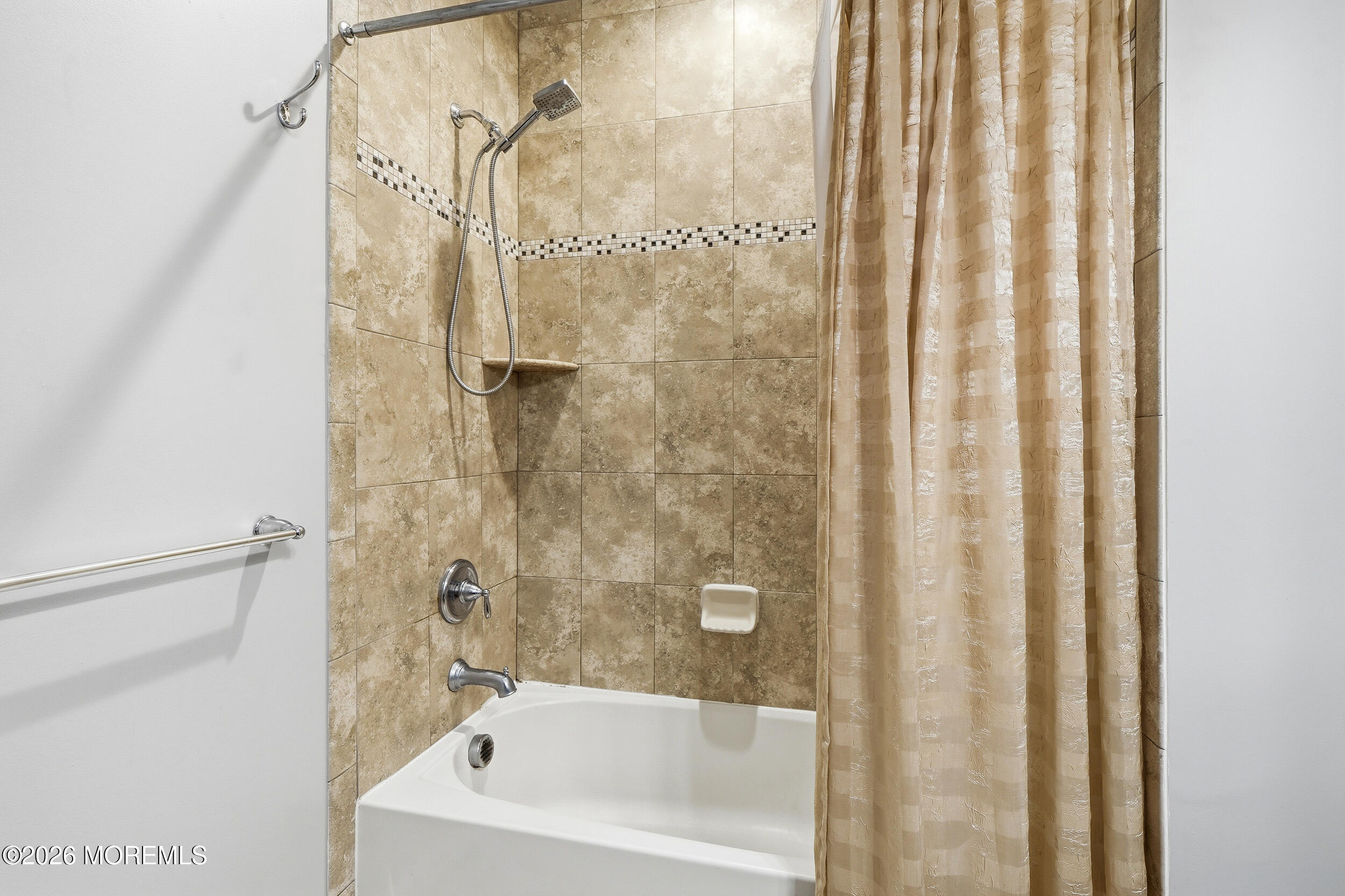 4 Kyle Drive Tinton Falls, NJ 07712 - Photo 18 of 28 a bathroom with a bathtub and shower