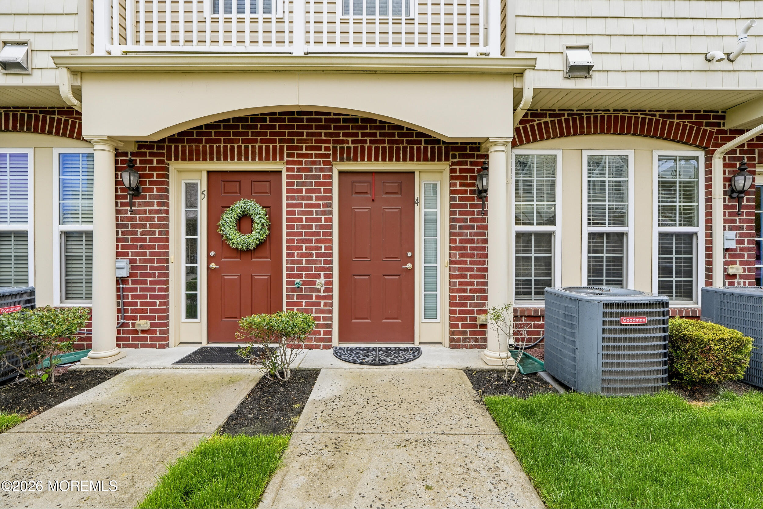 4 Kyle Drive Tinton Falls, NJ 07712 - Photo 2 of 28 a front view of a house with a garden