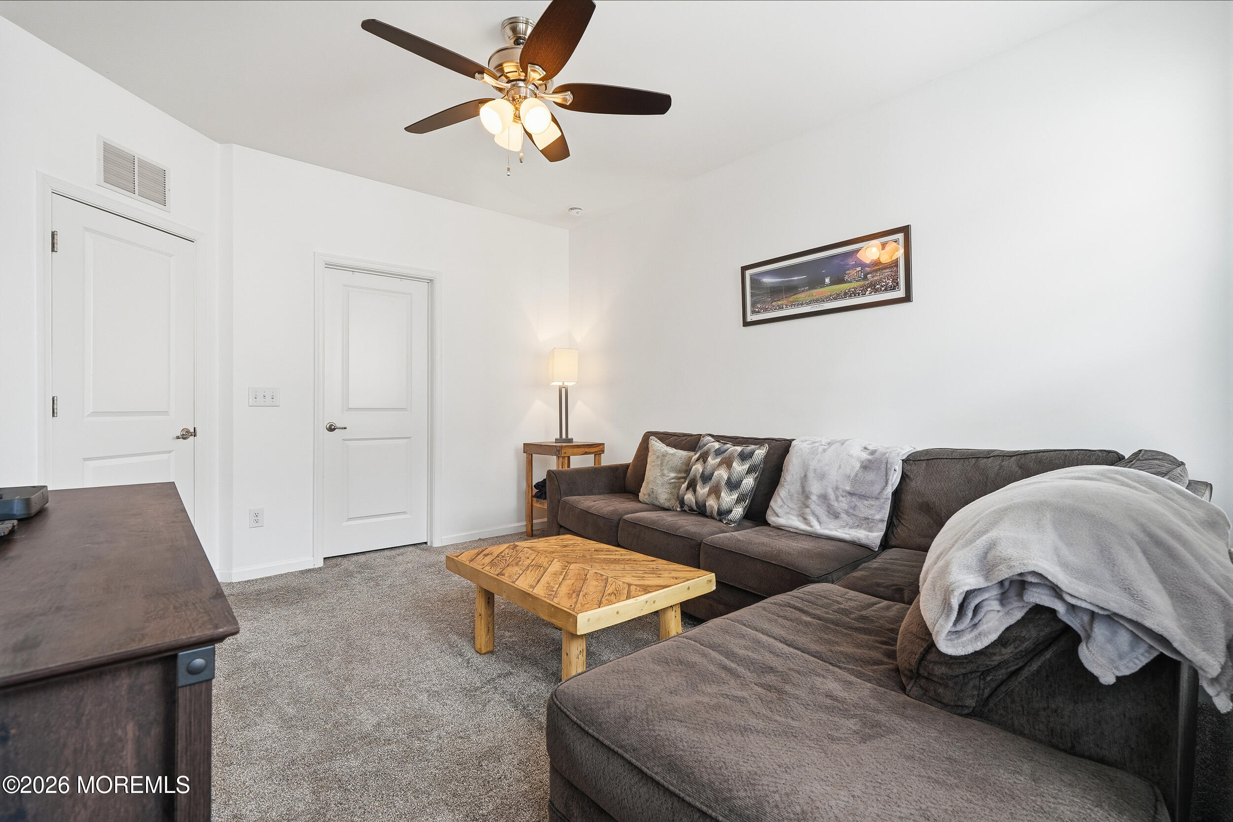 4 Kyle Drive Tinton Falls, NJ 07712 - Photo 21 of 28 a living room with furniture