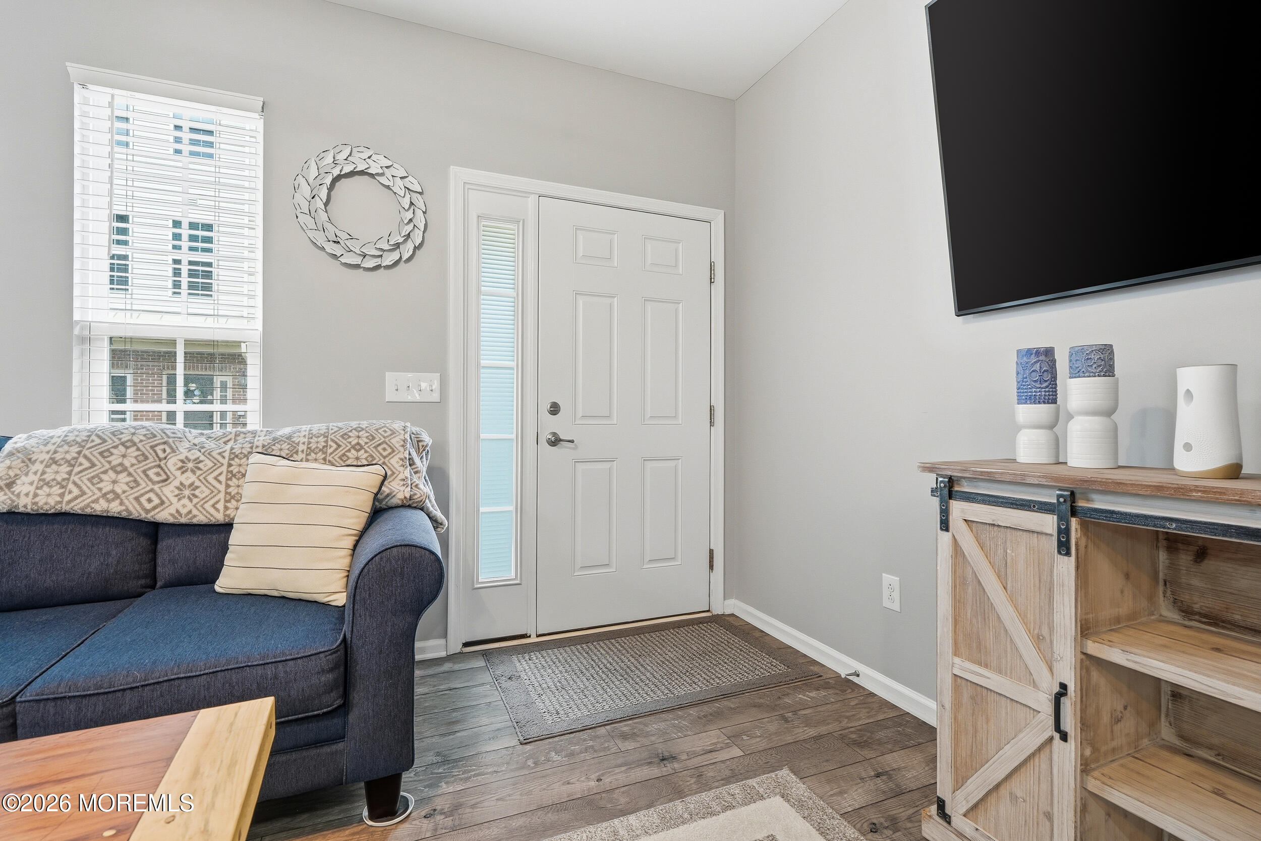 4 Kyle Drive Tinton Falls, NJ 07712 - Photo 5 of 28 a living room with furniture and a flat screen tv