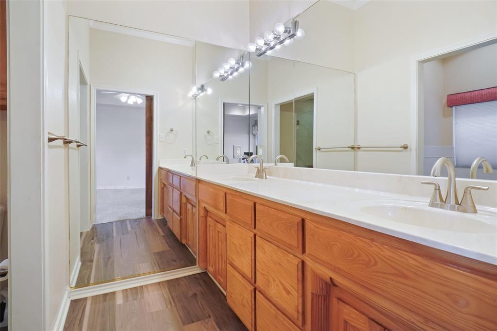 424 Half Moon Way Runaway Bay, TX 76426 - Photo 11 of 21 a spacious bathroom with double vanity and a mirror