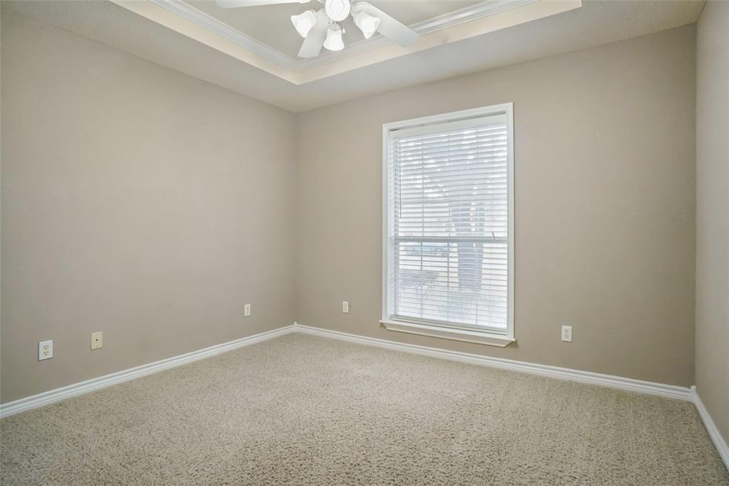 424 Half Moon Way Runaway Bay, TX 76426 - Photo 14 of 21 an empty room with a window