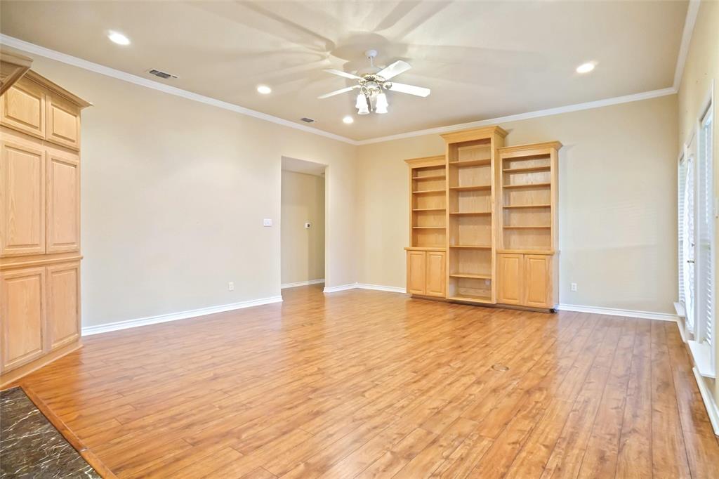424 Half Moon Way Runaway Bay, TX 76426 - Photo 4 of 21 wooden floor in an empty room with a window