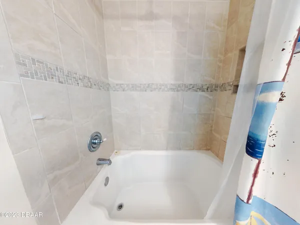 a bathroom with a bathtub