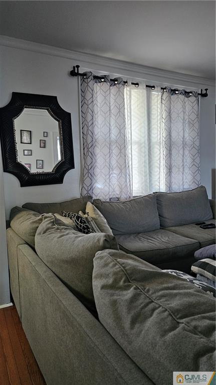 662 Jacques Street Perth Amboy, NJ 08861 - Photo 2 of 11 a living room with furniture and a window