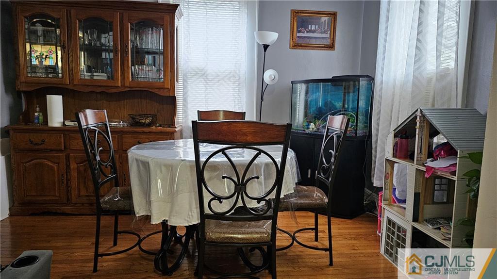 662 Jacques Street Perth Amboy, NJ 08861 - Photo 4 of 11 a view of entryway and hall with wooden floor