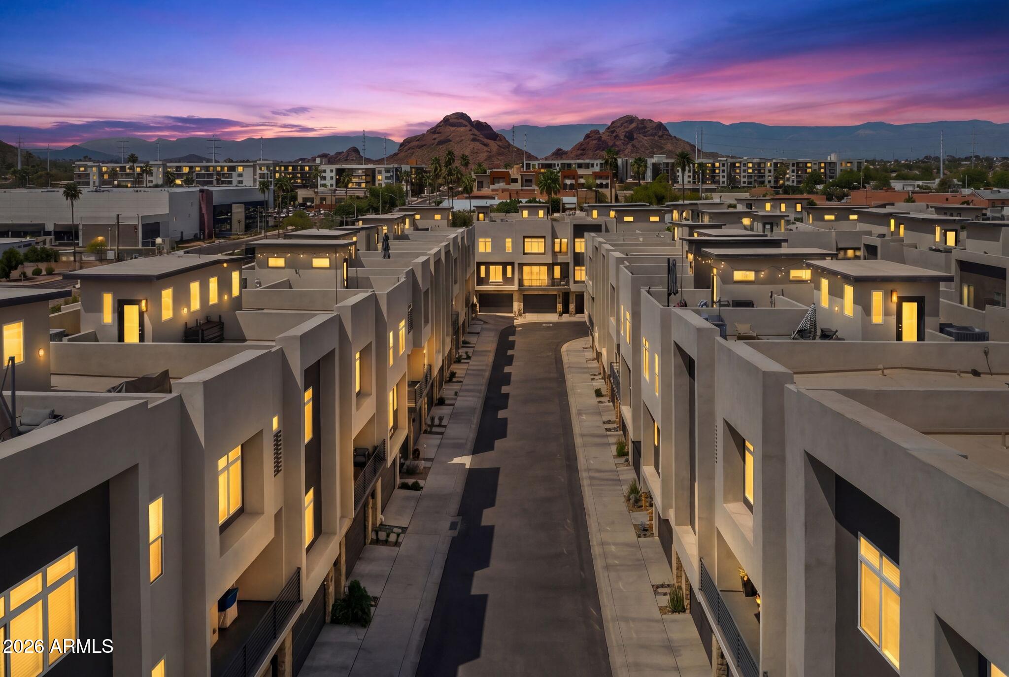 6850 East McDowell Road, Unit 14 Scottsdale, AZ 85257 - Photo 43 of 48 Twilight Aerial View of Community